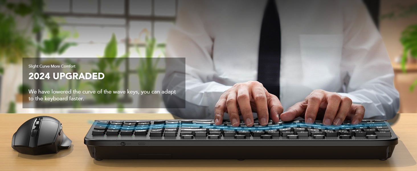 An office worker using a Sablute wireless keyboard and mouse on a desk
