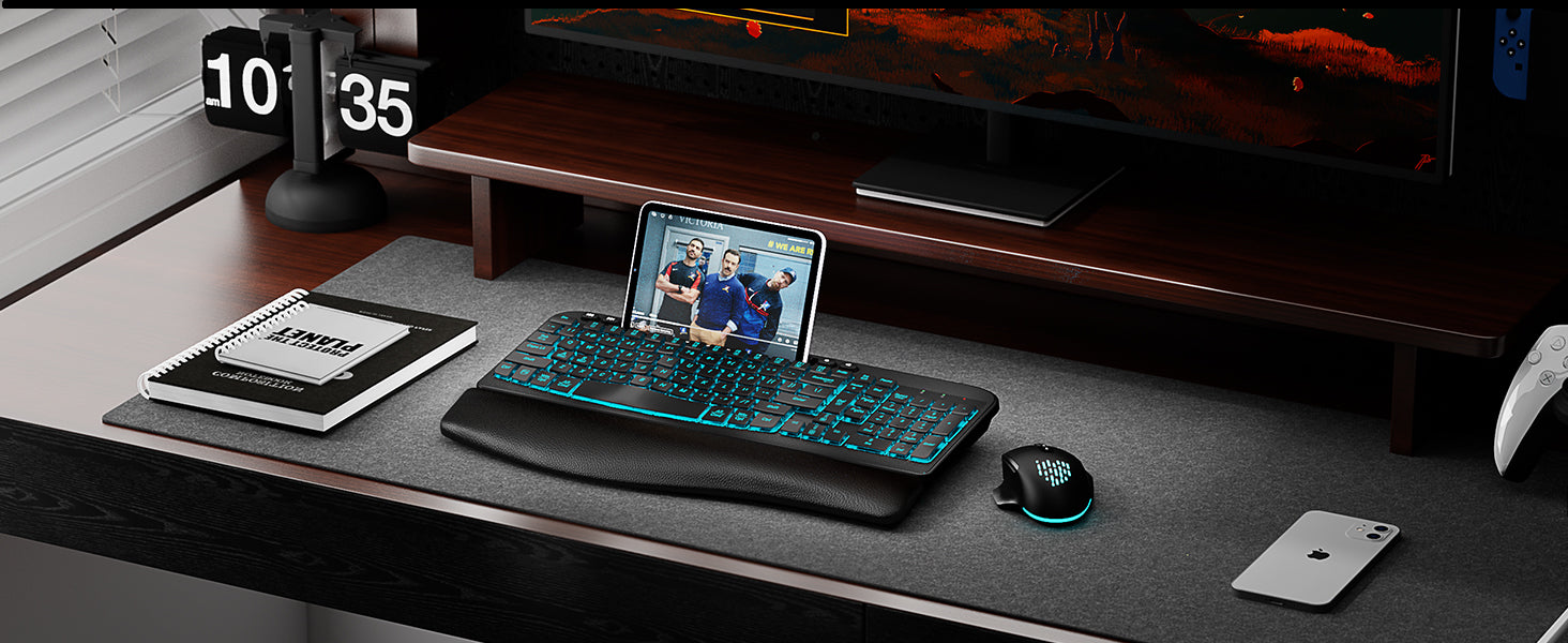 Desk setup with a computer monitor, Sablute ergonomic wireless keyboard and mouse set MA22 Pro and a tablet