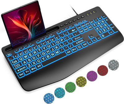 A black backlit wired USB keyboard with a large print design and a phone holder on the right side. The keyboard has a blue, red, green, and purple backlight shining through the black surface.